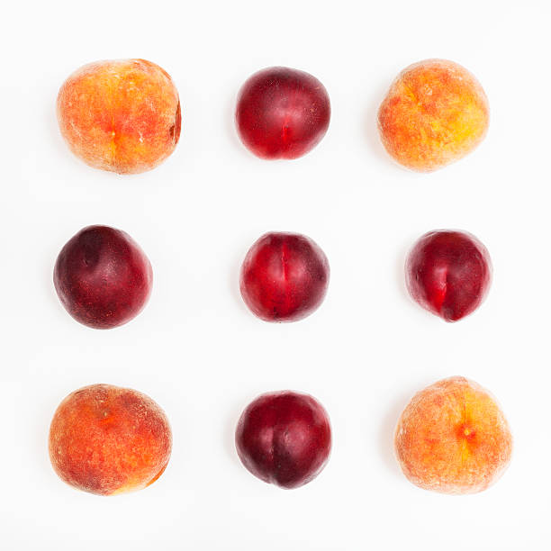 istock ripe nectarines and peaches arranged in square 592360150