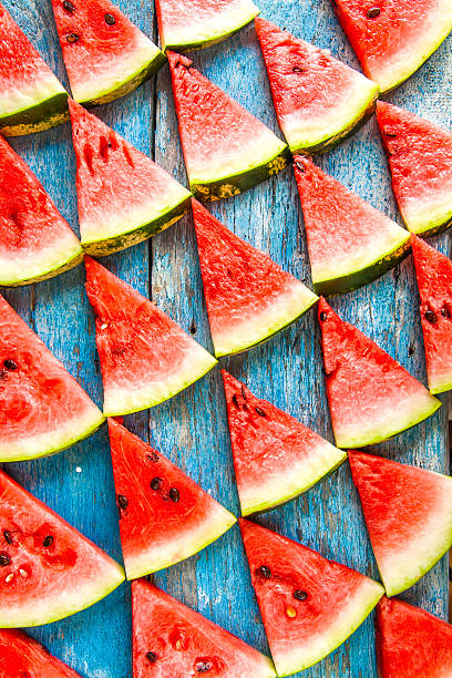 istock on a blue background flat triangles of watermelon 592361480