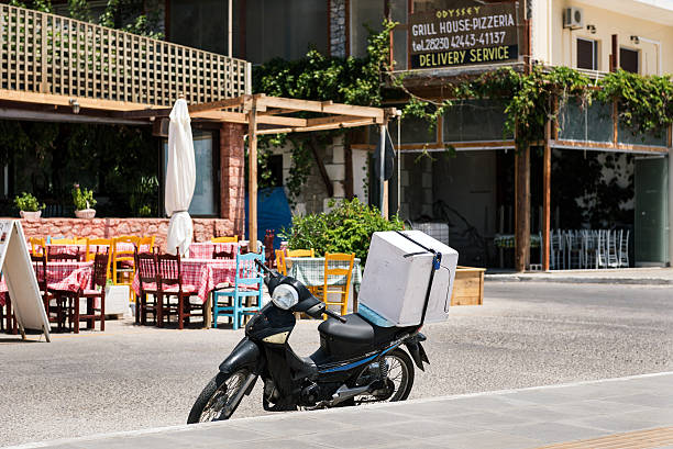 Traditional delivery transport in Paleochora town on Crete island Paleochora, Crete,  Greece- June 29, 2016: Traditional delivery transport in Paleochora town on Crete island park designer label stock pictures, royalty-free photos & images