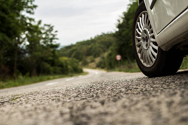 istock Car on a country road 592362432