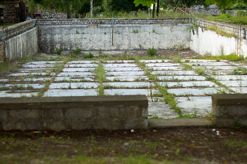 Abandoned Swiming Pool. Urban Decadence. Empty swimming pool.