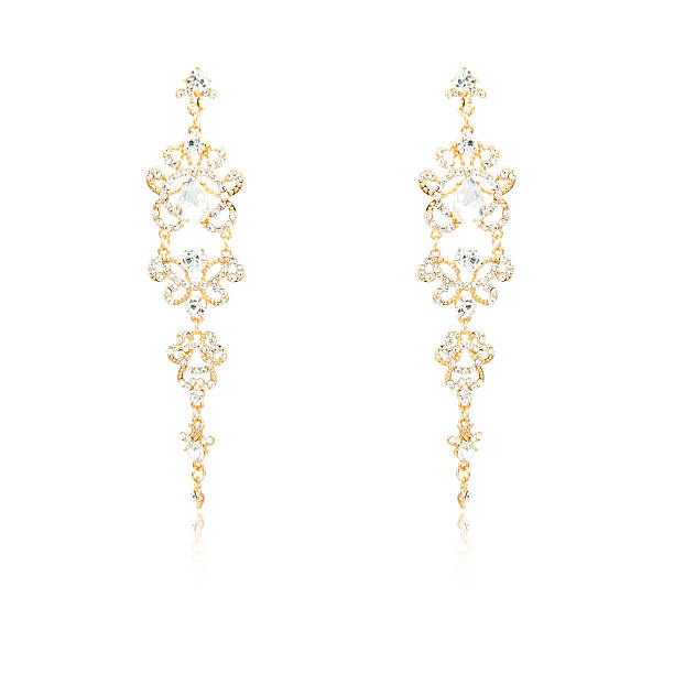 istock Pair of golden diamond earrings isolated on white 592364764