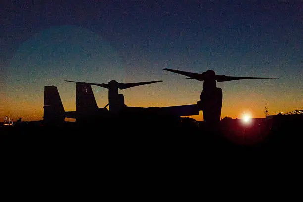 This is a photo of the v-22 taken during sunset.