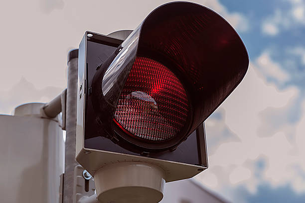 istock Red signal street traffic 592367464