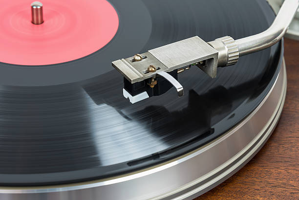 istock Closeup of turntable with vinyl record 592368052