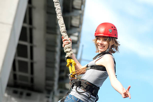 istock young woman after the bungee jump 592372044