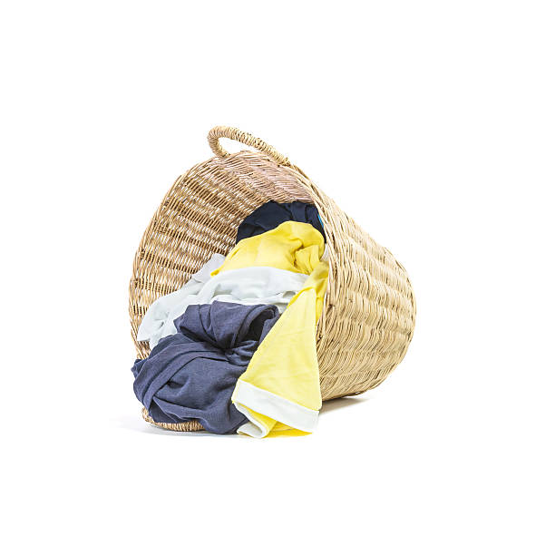 istock Closeup wood weave basket for used clothes 592376342