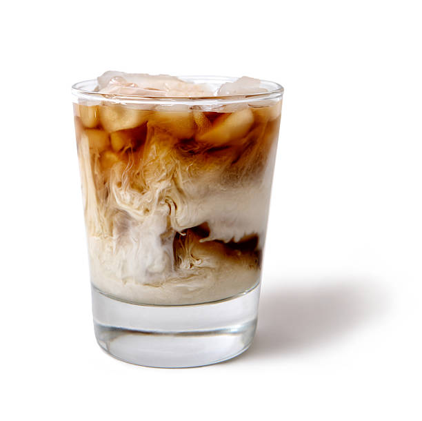 クリームが渦巻くアイスコーヒー - cappuccino swirl coffee cafe ストックフォトと画像