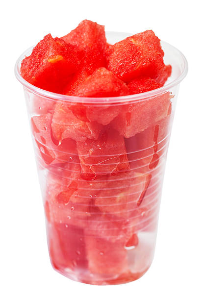 istock plastic glass with diced ripe watermelon isolated 592381204