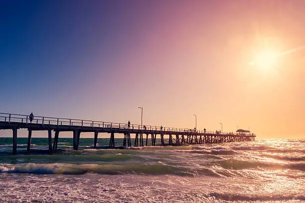 Photo of Henley Beach Jetty with people at sunset