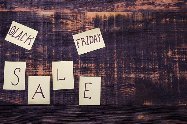 istock sale on a wooden background 592383716