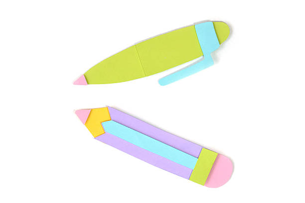 istock Pen and pencil on white background - isolated 592385198