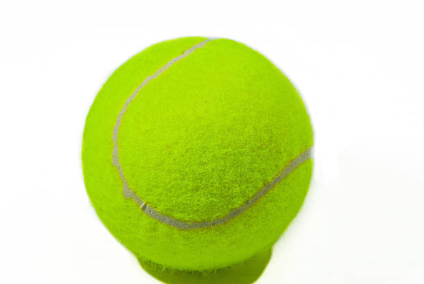 istock Tennis ball on white background 592387994
