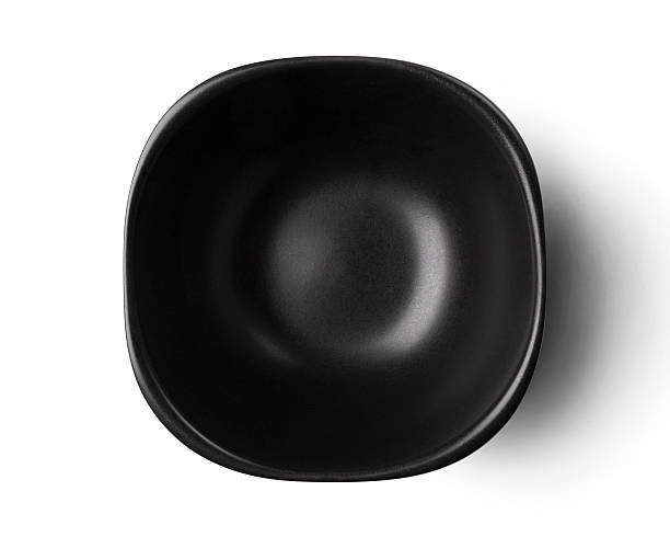 Empty black bowl isolated on white background with clipping path stock photo