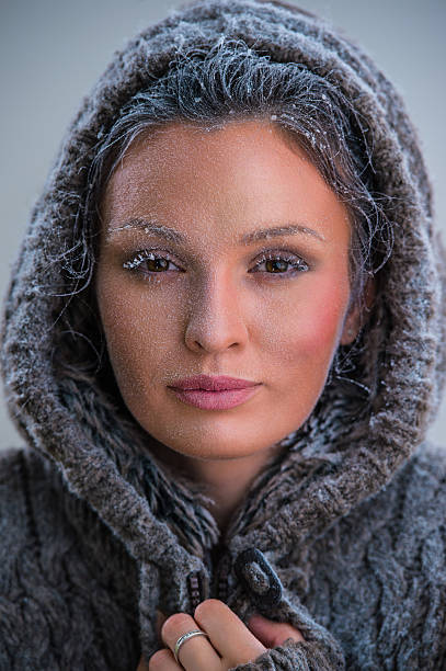 istock Young woman wearing hoodie 592390138