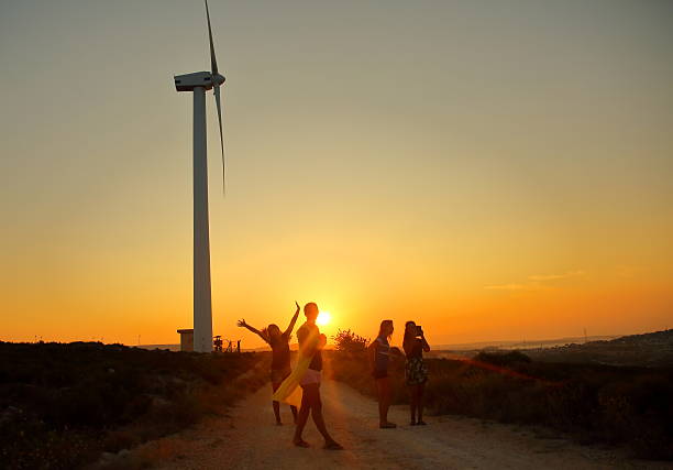 Young girl having fun at sunset.