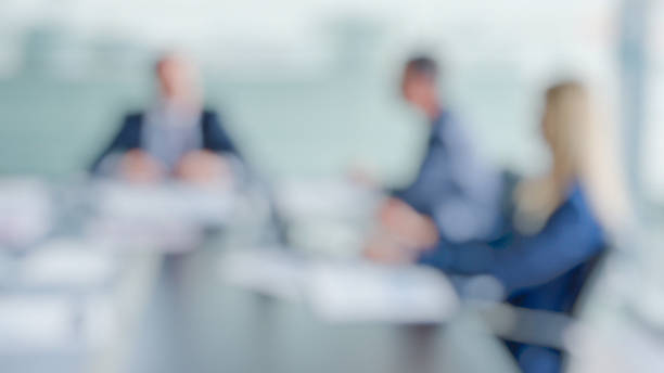 istock Defocused people at business meeting 592391502