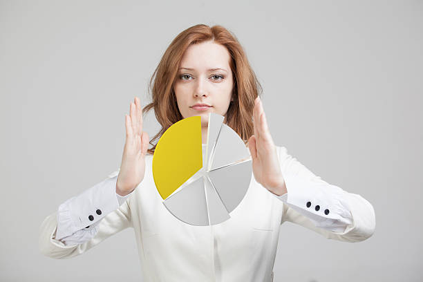 istock Woman shows a pie chart, circle diagram. Business analytics concept. 592394538