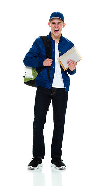 istock Cheerful student holding books 592395862