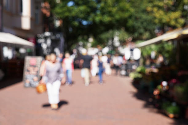 istock defocused pedestrian shopping street 592397980