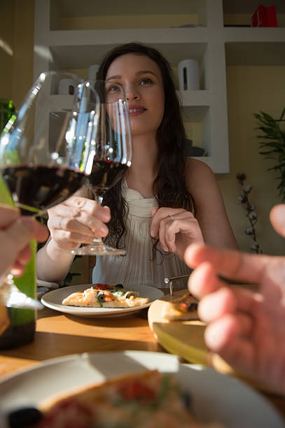 istock Couple having romantic dinner at home 592403832
