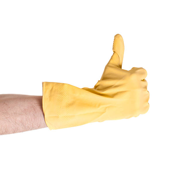 istock Hand in glove show ok 592403932