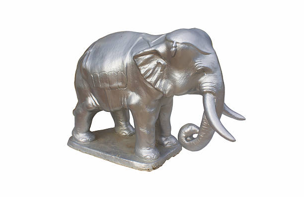istock silver elephant standing in front Shrine of Thailand 592404846