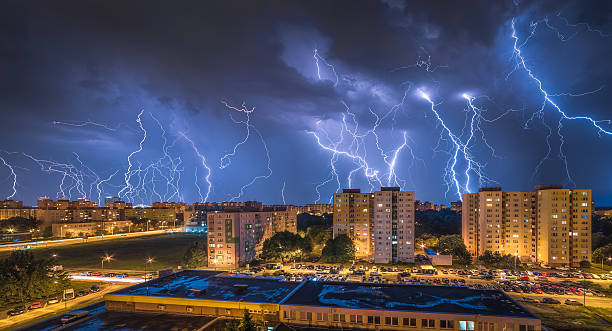 istock Lightnings Over Housing Estate 592407464