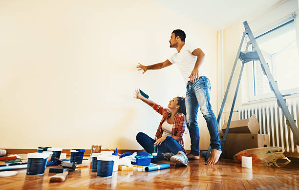 Couple decoration their apartment.