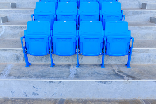 Blue seats in row on stadium