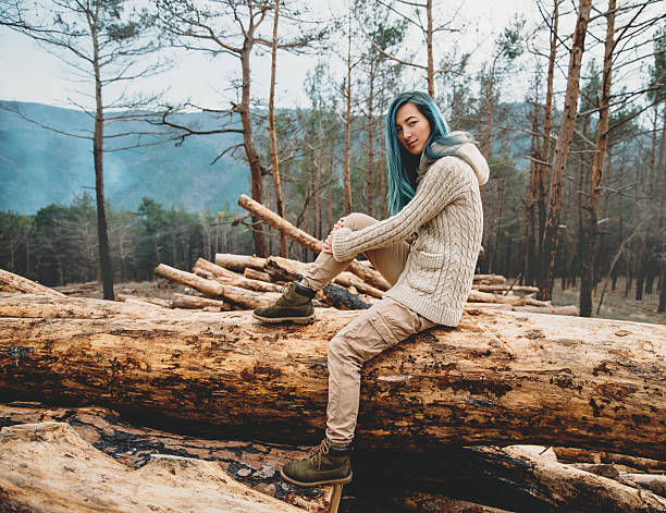 istock Girl resting in the forest 592644238