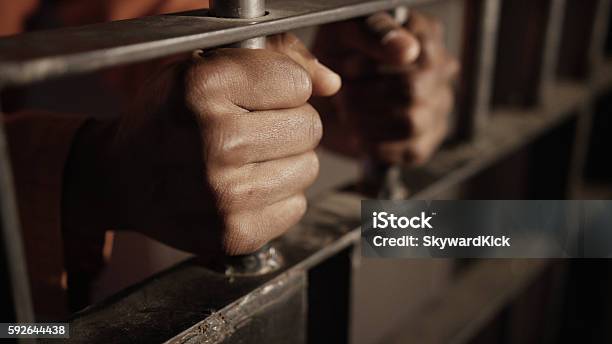 African American Oppression And Prison Stock Photo - Download Image Now - Racial Profiling, Criminal, Prison