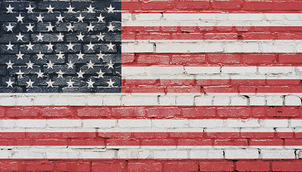istock USA flag painted on old brick wall 592645610