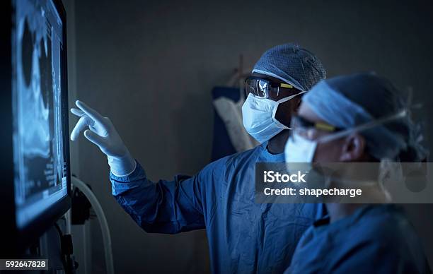 Surgical Excellence At Its Best Stock Photo - Download Image Now - Doctor, Surgeon, X-ray Image