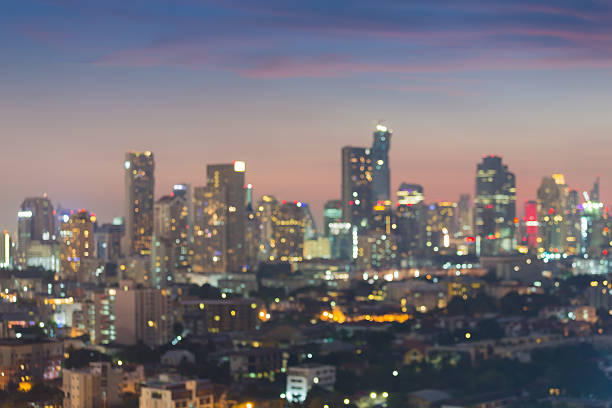istock Twilight, Blurred bokeh lights city office building 592650838