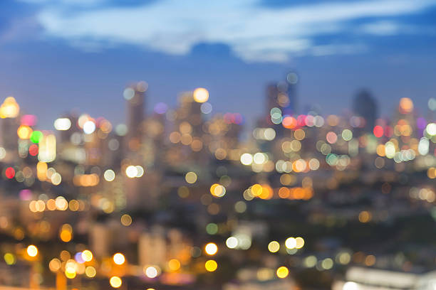 istock Twilights blurred bokeh urban lights, abstract background 592652260