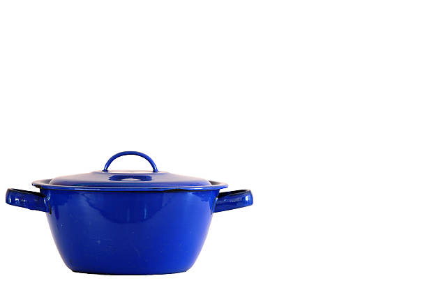 istock Blue enamel pot isolated on white background. 592652338