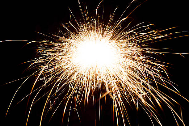 istock Christmas sparkler on black background. 592652392
