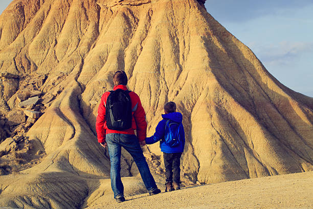 istock father and son travel in scenic mountains 592652814