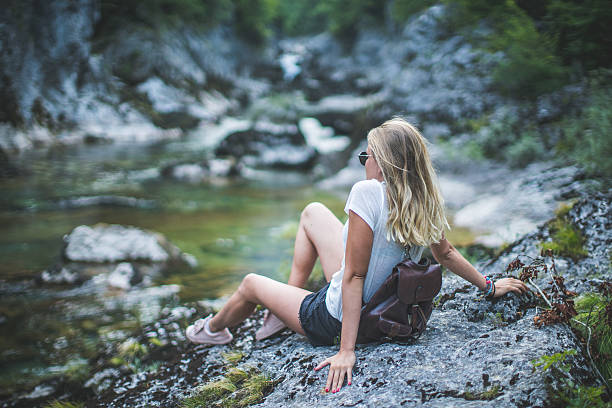 istock Girl and the lake 592653898