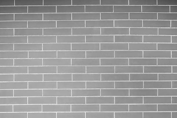 istock Black and white old vintage brick wall background. 592654298