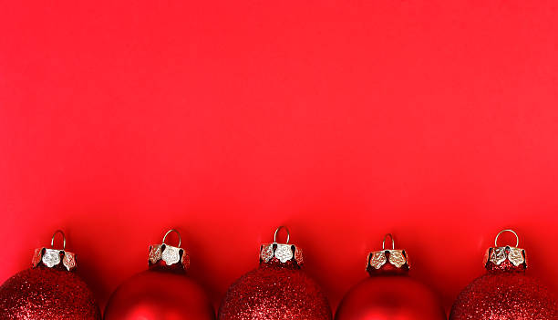 istock Christmas red background with balls 592656144