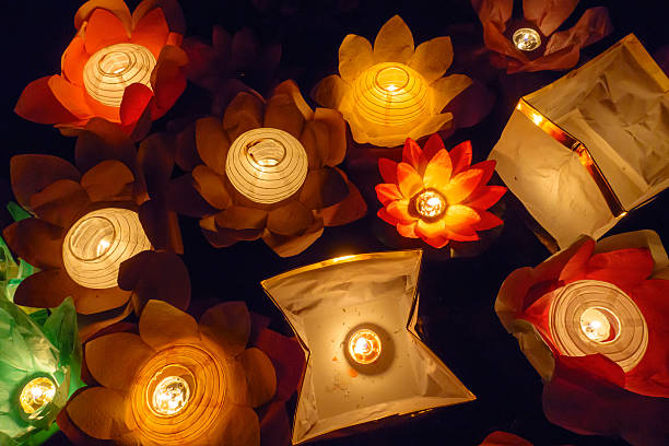 istock Floating Lotus Flower Paper Lanterns On Water 592657742