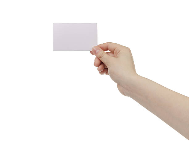istock young woman hand hold and showing empty paper card 592658200