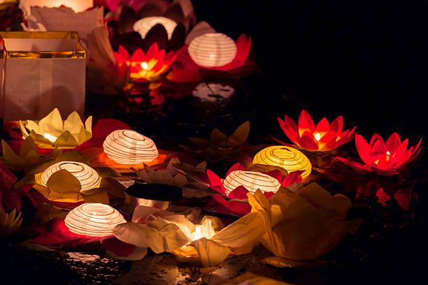 istock Floating Lotus Flower Paper Lanterns On Water 592658840