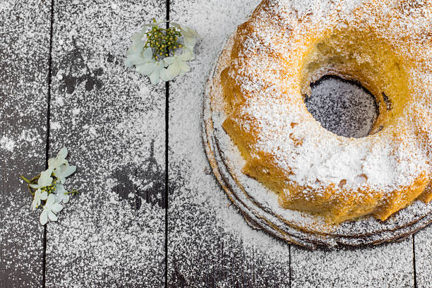 istock Top View on Bundt Cake with Sugar and Flower 592664786