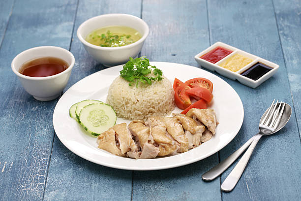 pollo con arroz hainanese - isla de hainan fotografías e imágenes de stock