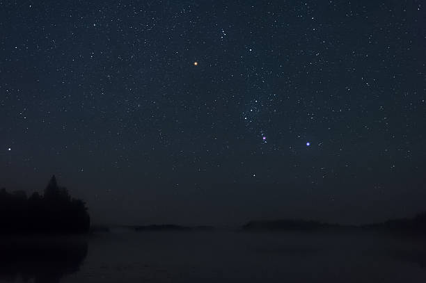 istock Orion constellation above misty lake 592668046