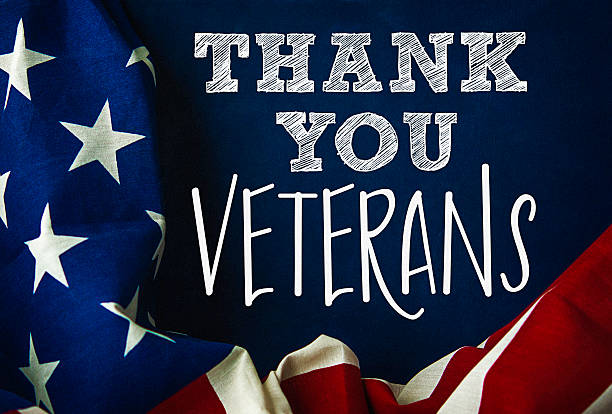 istock Chalkboard and flag with thank you message for US Veterans 592670572