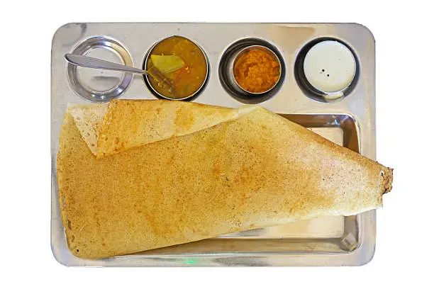 Photo of masala dosa , iplate isolated on the white background, Indian food